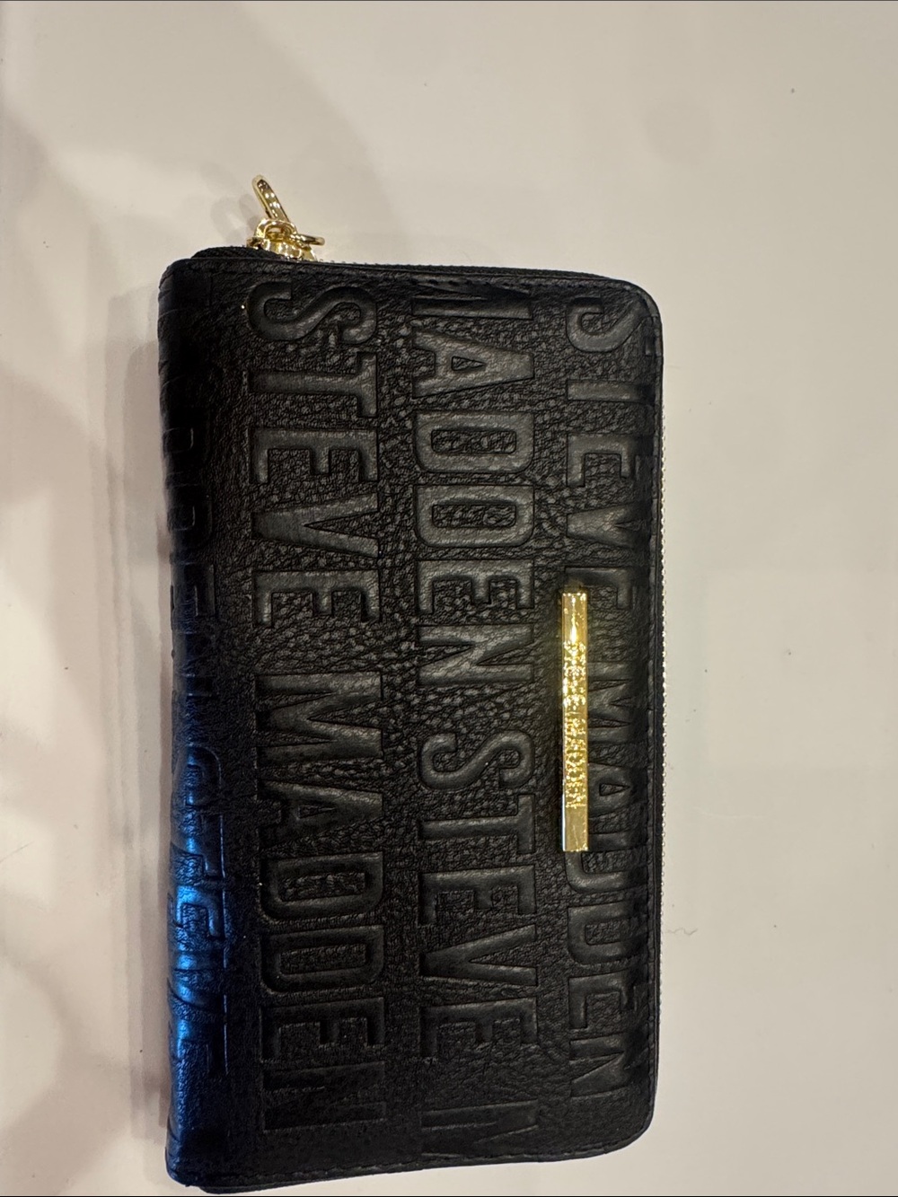 Steve Madden Black Embossed Wristlet with Gold Accent